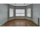 Bedroom with wood flooring and a bay window at 934 E Carlise Rd, Phoenix, AZ 85086