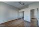 Bedroom with wood flooring and a closet with mirrored sliding doors at 934 E Carlise Rd, Phoenix, AZ 85086