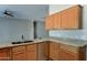 Bright kitchen featuring granite countertops, stainless steel appliances, and ample storage space in wood cabinetry at 934 E Carlise Rd, Phoenix, AZ 85086