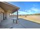 Inviting covered patio with beautiful desert views and ample space for outdoor living at 934 E Carlise Rd, Phoenix, AZ 85086