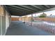 Covered patio overlooking a fenced pool area, perfect for outdoor relaxation and entertainment at 1001 W Montoya Ln, Phoenix, AZ 85027