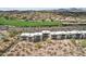 Aerial view of condo complex with golf course and mountain views at 10401 N Saguaro Blvd # 104, Fountain Hills, AZ 85268