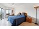 Bright bedroom with a work space, and a quirky nightstand against white walls at 10401 N Saguaro Blvd # 104, Fountain Hills, AZ 85268