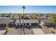 Eye-catching aerial perspective of a single-story home, showcasing its well-maintained exterior and desert landscaping at 10533 W Lawrence Ln, Peoria, AZ 85345