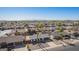 Lovely single-story home in a peaceful neighborhood with palm trees, a driveway, and desert landscaping at 10533 W Lawrence Ln, Peoria, AZ 85345