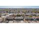 Aerial view of a residential neighborhood with well-maintained homes and green trees at 10533 W Lawrence Ln, Peoria, AZ 85345