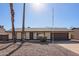 Charming single-story home with a gravel front yard and attached garage at 10533 W Lawrence Ln, Peoria, AZ 85345