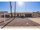 Traditional single-story home with a well-maintained front yard and a welcoming entrance at 10533 W Lawrence Ln, Peoria, AZ 85345