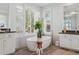 Bright bathroom featuring a freestanding tub, wooden accents, natural light, and modern fixtures at 10951 E Mirasol Cir, Scottsdale, AZ 85255