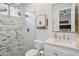 This stylish bathroom features a glass shower with a window, white tile and a cute picture at 10951 E Mirasol Cir, Scottsdale, AZ 85255