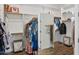 Spacious walk-in closet with organized storage, shelving, and ample space for clothing at 10951 E Mirasol Cir, Scottsdale, AZ 85255