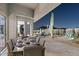 Outdoor dining area with mountain views and desert landscaping at 10951 E Mirasol Cir, Scottsdale, AZ 85255