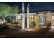 Desert home featuring native landscaping including a variety of mature cactus and desert plants at 10951 E Mirasol Cir, Scottsdale, AZ 85255