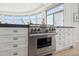Modern kitchen showcasing a high-end stainless steel range and custom cabinetry at 10951 E Mirasol Cir, Scottsdale, AZ 85255