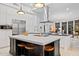 Bright kitchen boasts a large center island, stainless steel appliances, and an open design at 10951 E Mirasol Cir, Scottsdale, AZ 85255