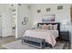 Calm main bedroom with luxury bedding, neutral colors, and decorative artwork at 10951 E Mirasol Cir, Scottsdale, AZ 85255