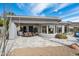 Inviting outdoor dining area on the patio with seamless indoor-outdoor flow and desert views at 10951 E Mirasol Cir, Scottsdale, AZ 85255