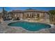 Backyard pool and patio highlighting home's architectural design, desert landscaping, and outdoor living at 10951 E Mirasol Cir, Scottsdale, AZ 85255