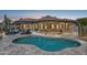 Outdoor pool area featuring desert landscaping and an expansive view of the home at 10951 E Mirasol Cir, Scottsdale, AZ 85255