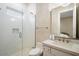 Contemporary bathroom featuring a glass-enclosed shower and sleek marble countertop at 12315 E Black Rock Rd, Scottsdale, AZ 85255