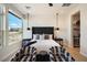Bright bedroom featuring high ceilings, and stylish hanging lights at 12315 E Black Rock Rd, Scottsdale, AZ 85255