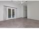 Bright bedroom with french doors that open to an outdoor patio space at 12770 N 145Th Way, Scottsdale, AZ 85259