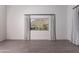 Bright bedroom featuring a large window with mountain views and neutral tones at 12770 N 145Th Way, Scottsdale, AZ 85259