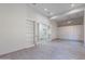 Bright flex space with built-ins, tiled floor, a ceiling fan and an attached office at 12770 N 145Th Way, Scottsdale, AZ 85259