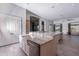 Modern kitchen with stainless appliances, large island, and open floorplan at 12770 N 145Th Way, Scottsdale, AZ 85259