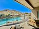 Relax on the patio with great views of the sparkling pool, mountain and lush desert landscape at 12770 N 145Th Way, Scottsdale, AZ 85259