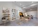 Bright and airy studio space with built-in shelving and ample storage for creative projects at 12770 N 145Th Way, Scottsdale, AZ 85259