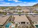 Backyard view of a well-maintained home with a pool, spa, and outdoor living space at 1319 N Chatsworth St, Mesa, AZ 85207