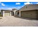 Close-up shot of a home's garages, showcasing a brick driveway and elegant design at 1319 N Chatsworth St, Mesa, AZ 85207