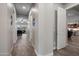 Hallway leading to bedroom and living area with tile flooring at 1319 N Chatsworth St, Mesa, AZ 85207