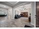Open-concept living space with archways, a ceiling fan, and elegant furnishings at 1319 N Chatsworth St, Mesa, AZ 85207