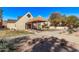 Inviting building entrance with covered walkway, landscaping, and architectural details at 1340 N Recker Rd # 118, Mesa, AZ 85205