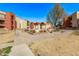 Lush landscaped courtyard offering a serene and inviting communal space for residents at 1340 N Recker Rd # 118, Mesa, AZ 85205