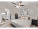 Spacious main bedroom with natural light from the window and adjoining full bathroom at 1340 N Recker Rd # 118, Mesa, AZ 85205