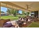 Covered patio with beautiful views of the yard and surrounding neighborhood at 13410 N Cedar Dr, Sun City, AZ 85351