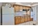 Well-equipped kitchen features ample cabinet space, modern appliances, and granite countertops for functionality at 13410 N Cedar Dr, Sun City, AZ 85351