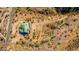 Aerial view of a desert home and property outlined in blue showing mature desert landscaping at 14426 N Vista Del Oro --, Scottsdale, AZ 85264