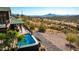 Aerial view of a refreshing pool and desert landscape beyond the property at 14426 N Vista Del Oro --, Fort McDowell, AZ 85264