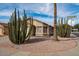 Desert landscaping complements this corner lot house, enhancing the curb appeal at 15002 W Heritage Oak Way, Surprise, AZ 85374