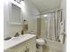 Clean bathroom with a white vanity, mirror, and shower-tub combination at 17200 W Bell Rd # 1551, Surprise, AZ 85374