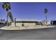 Exterior view of well-maintained home with desert landscaping on a corner lot at 17200 W Bell Rd # 1551, Surprise, AZ 85374