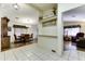 Open-concept living area featuring tile floors, dining, and living spaces at 17200 W Bell Rd # 1551, Surprise, AZ 85374