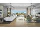 Bright living room with stylish furnishings, expansive sliding glass doors, and a welcoming atmosphere at 17801 W Mountainair St, Surprise, AZ 85388