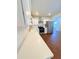Spacious kitchen features stainless steel appliances, white cabinets, and quartz countertops at 1837 W Virginia Ave, Phoenix, AZ 85007