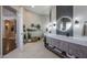 Bright bathroom with double vanity, stylish lighting, and modern fixtures at 18919 W Verde Ln, Litchfield Park, AZ 85340