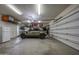 Spacious garage with ample storage and a modern vehicle, offering convenience and functionality at 18919 W Verde Ln, Litchfield Park, AZ 85340
